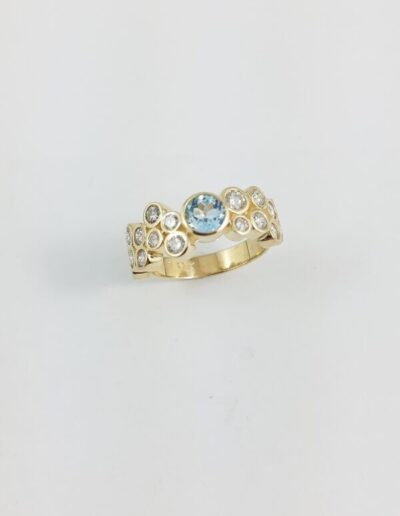 10KY Gold Blue Topaz and Diamond Ring